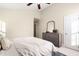 Bedroom with dresser and ceiling fan at 114 Legault Dr, Cary, NC 27513