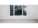 Bedroom with large bay window offering natural light and outside views at 1210 Huntsman Dr, Durham, NC 27713