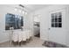 Bright breakfast nook featuring a cozy table with a view of the outside and a door to the laundry room at 1210 Huntsman Dr, Durham, NC 27713