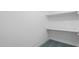 This closet features convenient built-in shelves, perfect for maximizing storage space and organization at 1210 Huntsman Dr, Durham, NC 27713
