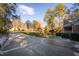 Residential street view with a home on a well-maintained lawn at 1210 Huntsman Dr, Durham, NC 27713