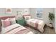 Charming bedroom with two twin beds at 124 Camel Crazies Pl # 43, Lillington, NC 27546