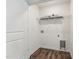 Bright laundry room with shelving and vinyl flooring at 124 Camel Crazies Pl # 43, Lillington, NC 27546