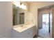 Bathroom with vanity and a view into another room at 2206 Gathering Sq Ct # 2206, Fuquay Varina, NC 27526