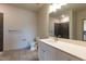 Clean bathroom with white vanity and dark tile shower at 2206 Gathering Sq Ct # 2206, Fuquay Varina, NC 27526