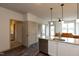 Modern kitchen with granite countertops, stainless steel appliances, and white shaker cabinets at 2206 Gathering Sq Ct # 2206, Fuquay Varina, NC 27526