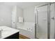 Bathroom with soaking tub, shower, and double vanity at 2225 Raven Rd # 107, Raleigh, NC 27614