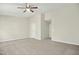 Large bedroom with neutral walls and carpet flooring at 2225 Raven Rd # 107, Raleigh, NC 27614