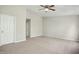 Spacious bedroom with neutral walls and carpet flooring at 2225 Raven Rd # 107, Raleigh, NC 27614
