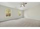 Bright bedroom with neutral walls and carpet flooring at 2225 Raven Rd # 107, Raleigh, NC 27614