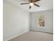 Well-lit bedroom with carpeted floor and window at 2225 Raven Rd # 107, Raleigh, NC 27614