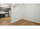 Dining area with hardwood floors and kitchen access at 2225 Raven Rd # 107, Raleigh, NC 27614