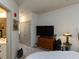 Spacious bedroom with ample storage, dresser and an ensuite bathroom view at 2313 Gathering Square Ct # 2313, Fuquay Varina, NC 27526