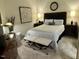 Spacious bedroom with a comfortable bed and nightstands at 2313 Gathering Square Ct # 2313, Fuquay Varina, NC 27526