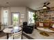 Inviting living room featuring a stylish bookcase wall and modern furnishings at 2313 Gathering Square Ct # 2313, Fuquay Varina, NC 27526