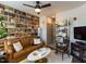 Cozy living room features unique wallpaper, comfortable seating, and stylish decor at 2313 Gathering Square Ct # 2313, Fuquay Varina, NC 27526