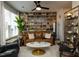 Comfortable living room showcasing a stylish bookcase wall and modern decor at 2313 Gathering Square Ct # 2313, Fuquay Varina, NC 27526