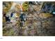 Home situated on a wooded lot with a driveway and detached structure at 3 Moss Spring Ct, Durham, NC 27712