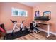 Home office with hardwood floors and Peloton bike at 3 Moss Spring Ct, Durham, NC 27712