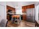 Well-equipped kitchen with wooden cabinets and stainless steel appliances at 3 Moss Spring Ct, Durham, NC 27712