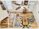 Living room with hardwood floors and ceiling fan at 3 Moss Spring Ct, Durham, NC 27712