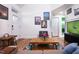 Spacious living area with hardwood floors, a sofa, and a rustic coffee table at 3 Moss Spring Ct, Durham, NC 27712