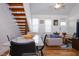 Open living area featuring a comfortable sofa and dining area at 3 Moss Spring Ct, Durham, NC 27712