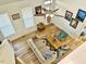 Living room with hardwood floors and ceiling fan at 3 Moss Spring Ct, Durham, NC 27712