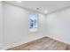 Bright bedroom with hardwood floors and a window with natural light at 406 Everette Ave, Clayton, NC 27520