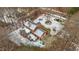 Aerial view of house, yard, and driveway with snow on the ground at 4139 Somerset Dr, Oxford, NC 27565