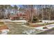 Two-story brick house, snowy yard at 4139 Somerset Dr, Oxford, NC 27565