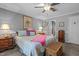 Spacious bedroom with queen-sized bed, nightstands, and a ceiling fan at 4139 Somerset Dr, Oxford, NC 27565