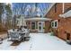 Deck with table and chairs, snowy scene at 4139 Somerset Dr, Oxford, NC 27565