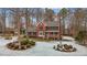 Two-story brick home with covered porch and landscaping at 4139 Somerset Dr, Oxford, NC 27565