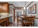 Eat-in kitchen with wood cabinets and a view to the Gathering room at 4139 Somerset Dr, Oxford, NC 27565