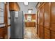 Well-lit kitchen features custom cabinets and stainless steel refrigerator at 4139 Somerset Dr, Oxford, NC 27565