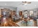 Spacious living room with wood floors, comfortable seating, and natural light at 4139 Somerset Dr, Oxford, NC 27565
