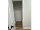 Open closet with hardwood floors and ample hanging space at 504 Tucker St, Four Oaks, NC 27524
