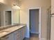 Double vanity bathroom with granite countertop at 549 Balsam Fir Dr Dr, Cary, NC 27519
