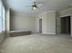 Large bedroom with ceiling fan and access to other rooms at 549 Balsam Fir Dr Dr, Cary, NC 27519