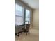 Bright bedroom with two large windows and a desk at 549 Balsam Fir Dr Dr, Cary, NC 27519