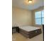 Bright bedroom with large window and neutral decor at 549 Balsam Fir Dr Dr, Cary, NC 27519