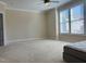 Spacious bedroom with large windows and ceiling fan at 549 Balsam Fir Dr Dr, Cary, NC 27519