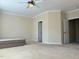 Large bedroom with ceiling fan and access to other rooms at 549 Balsam Fir Dr Dr, Cary, NC 27519