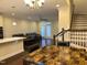 Kitchen and dining area with granite-top table and chairs at 549 Balsam Fir Dr Dr, Cary, NC 27519
