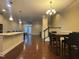 Open dining area with hardwood floors and kitchen view at 549 Balsam Fir Dr Dr, Cary, NC 27519