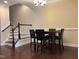 Bright dining area with hardwood floors and staircase view at 549 Balsam Fir Dr Dr, Cary, NC 27519
