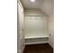 Inviting entryway with built-in bench and storage at 549 Balsam Fir Dr Dr, Cary, NC 27519