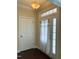 Entryway with hardwood floors and white interior door at 549 Balsam Fir Dr Dr, Cary, NC 27519