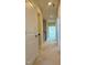 Bright hallway with carpeted flooring and doors to bedrooms at 549 Balsam Fir Dr Dr, Cary, NC 27519
